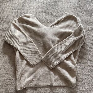 Miracle Cream Sweater with knotted back